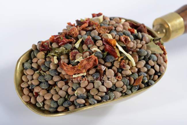 Closeup view of a mix of lentils, dried vegetables and herbs — Stock Photo