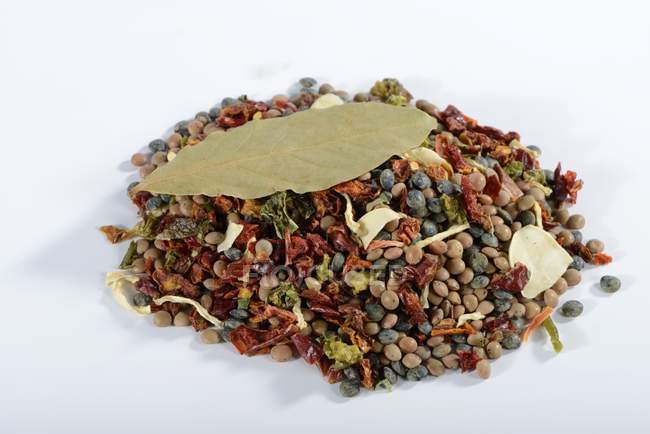 A mix of lentils, dried vegetables, herbs and spices — Stock Photo