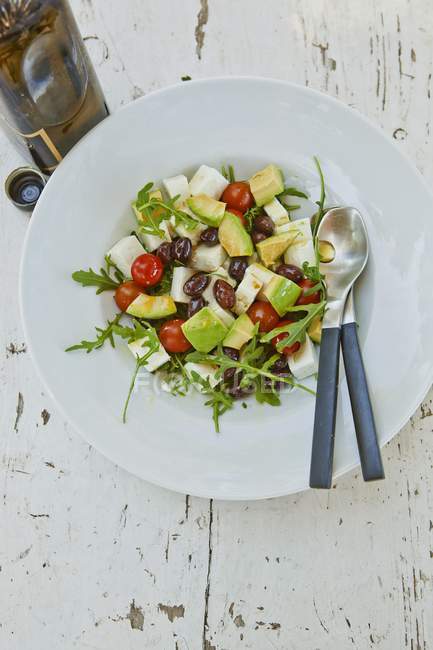 Avocado salad with tomatoes — Stock Photo