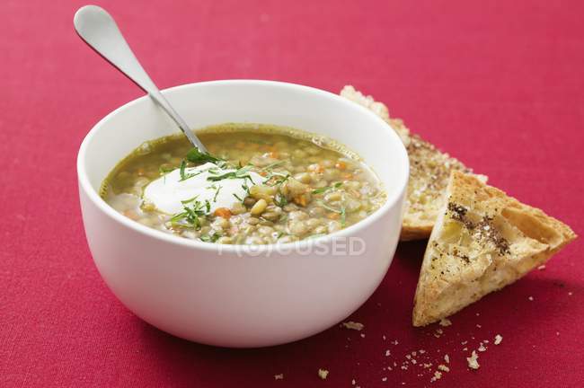 Minestrone with cream and with ciabatta — Stock Photo