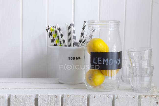 Jar of fresh lemons — Stock Photo