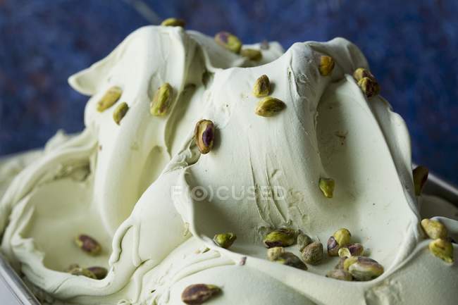 Pistachio ice cream with pistachios — Stock Photo