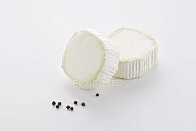 Two slices of goat cheese — Stock Photo