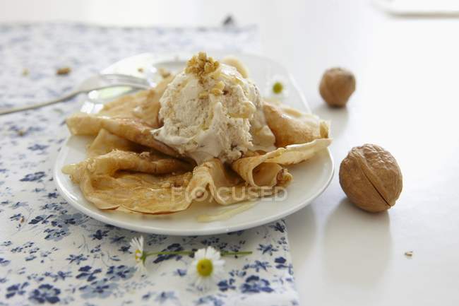 Crepes with walnut ice cream — Stock Photo