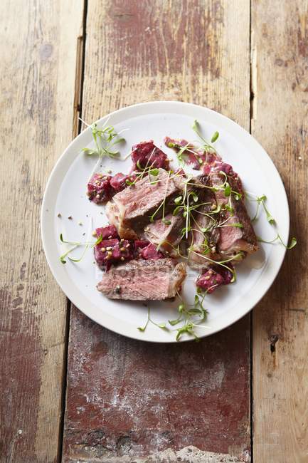 Roast beef with sprouts — Stock Photo