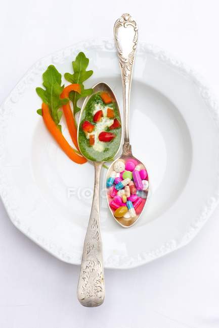 Spoonful of herb sauce with peppers — Stock Photo