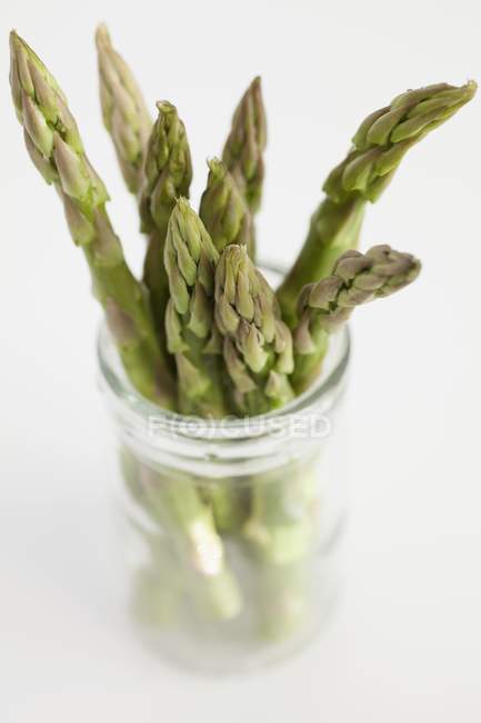 Green Asparagus in jar — Stock Photo