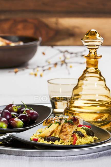 Chicken meat with saffron rice — Stock Photo