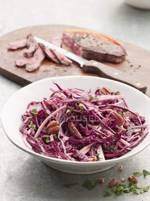 Coleslaw and Steak on board — Stock Photo