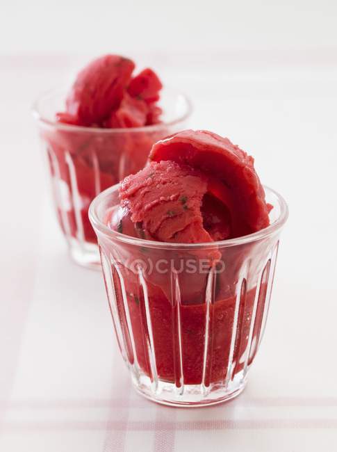 Raspberry sorbet in two glasses — Stock Photo