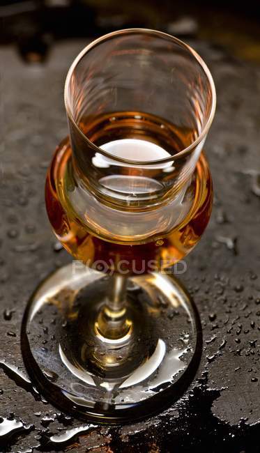 Closeup view of Grappa in a stemmed glass — Stock Photo