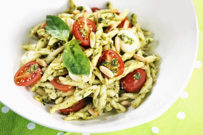 Strozzapreti pasta with cherry tomatoes — Stock Photo
