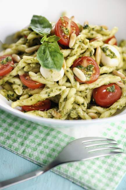 Strozzapreti pasta with cherry tomatoes — Stock Photo