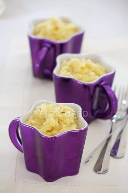 Tres tazas de risotto - foto de stock
