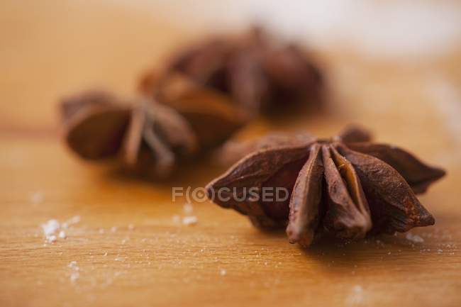 Star anise on a wooden board — Stock Photo