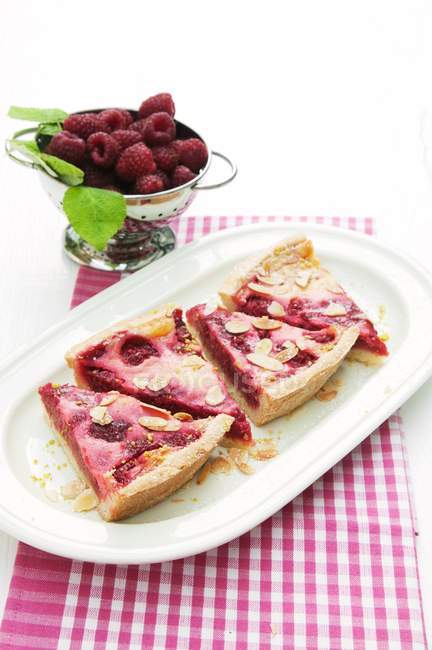 Raspberry cheesecake on plate — Stock Photo