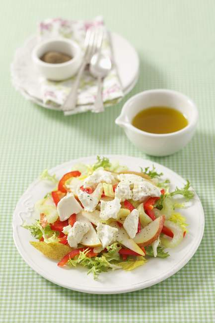 Salad with pears on plate — Stock Photo