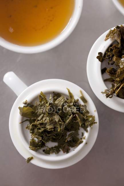 Sobras de hojas de té verde - foto de stock