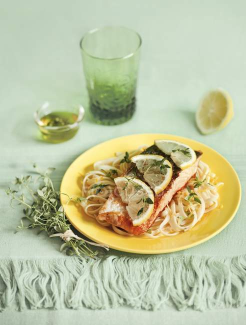 Salmon fillet and noodles — Stock Photo