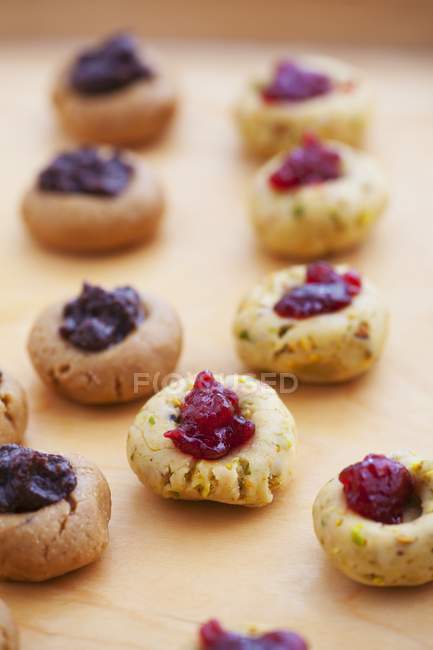 Unbaked chocolate and pistachio biscuits — Stock Photo