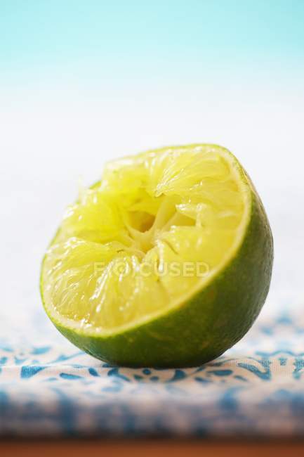 Squeezed lime half — Stock Photo