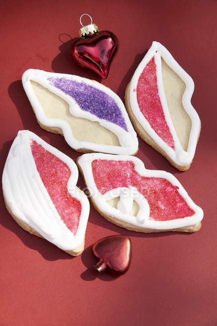 Christmas cookies decorated like lips — Stock Photo