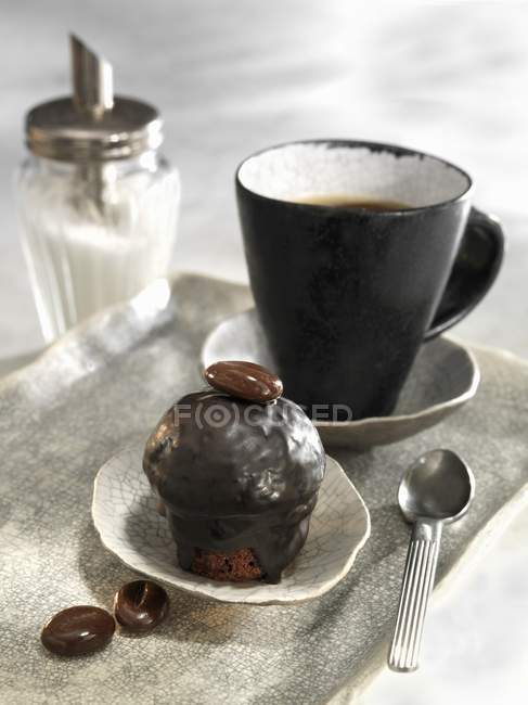 Espresso muffin with chocolate icing — Stock Photo