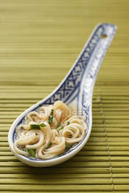 Spoon of noodle soup — Stock Photo