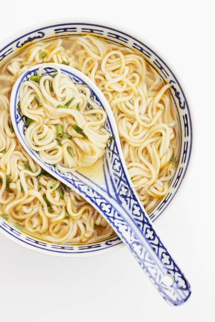 Noodle soup with chopped chives — Stock Photo