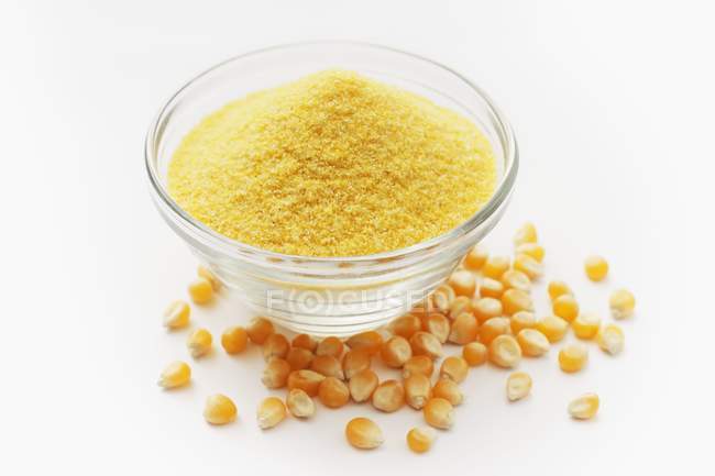 Polenta and corn kernels — Stock Photo