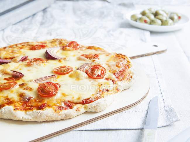 Vegetarian stone-baked pizza — Stock Photo