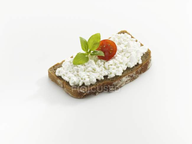 Bread topped with cheese — Stock Photo
