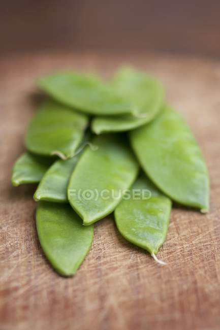 Fresh sugar peas in pods — Stock Photo