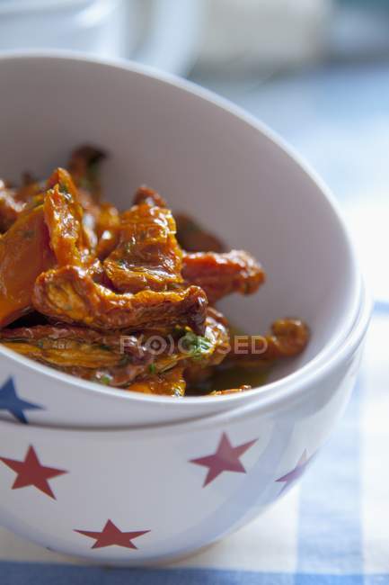 Sundried tomatoes with olive oil — Stock Photo