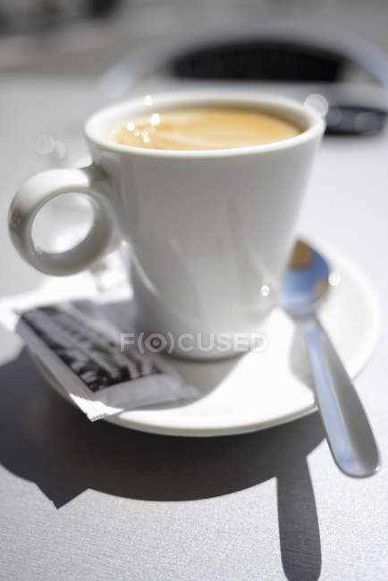 Latte in white cup — Stock Photo