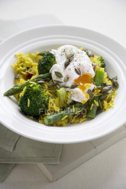 Vegetable kedgeree with curry rice — Stock Photo