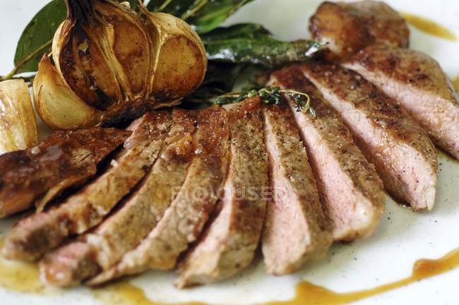 Sliced roasted beef steak — Stock Photo