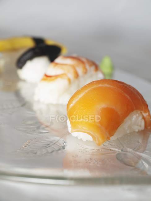 Assorted sushi on platter — Stock Photo