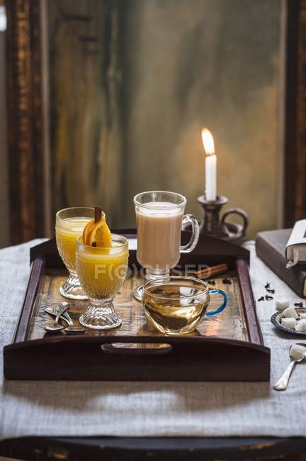 Elevated view of assorted hot drinks on a tray — Stock Photo