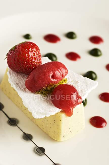 Vanilla parfait with strawberry sorbet — Stock Photo