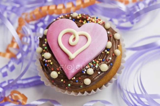 Cupcake decorated with chocolate — Stock Photo