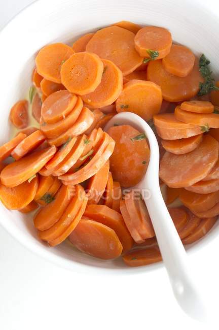 Cooked carrots with juice — Stock Photo