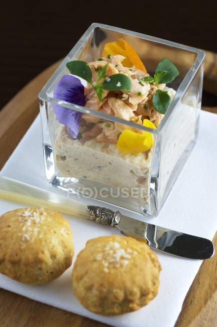 Closeup view of poached rainbow trout on trout puree with scones — Stock Photo