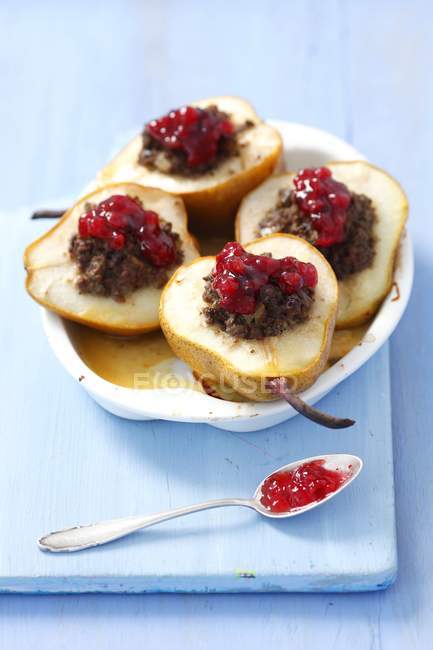 Closeup view of pears filled with chicken livers and cranberries — Stock Photo