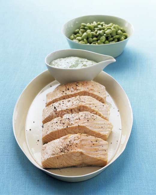 Poached salmon with herb quark — Stock Photo