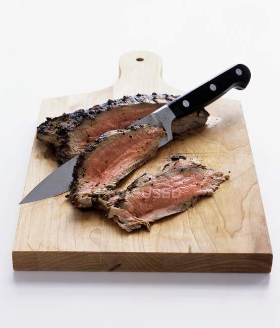 Sliced roasted beef — Stock Photo