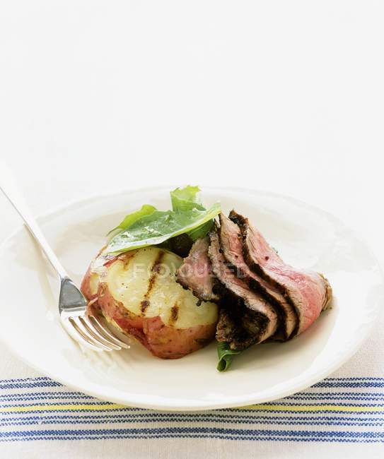Slices of roasted beef with potato — Stock Photo