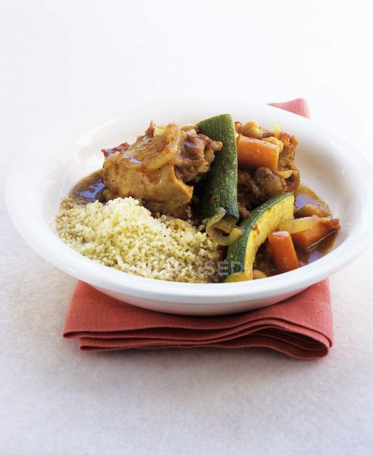 Chicken and vegetable tagine with couscous — Stock Photo