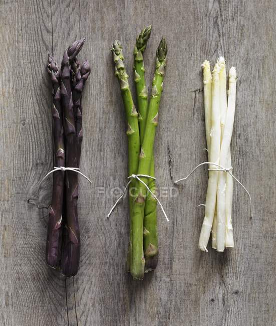 Purple with green and white asparagus — Stock Photo