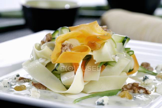 Vegetable pasta with nuts — Stock Photo
